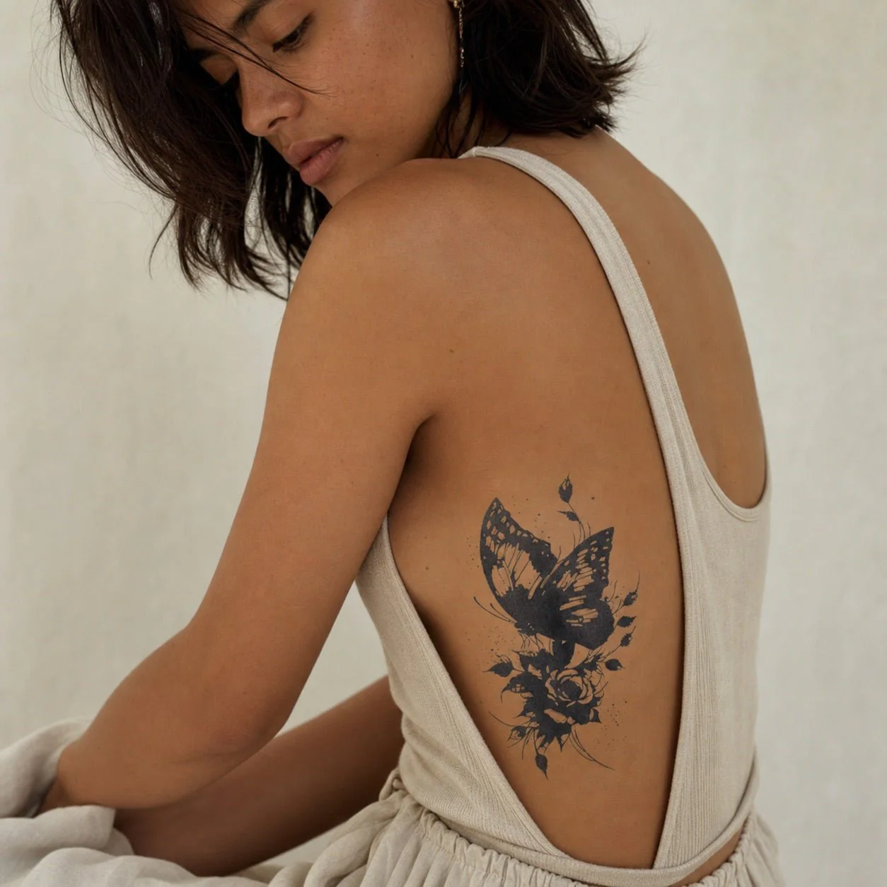 Dark Butterfly Rose Tattoo