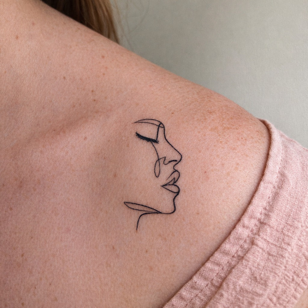 One Line Face Tattoo