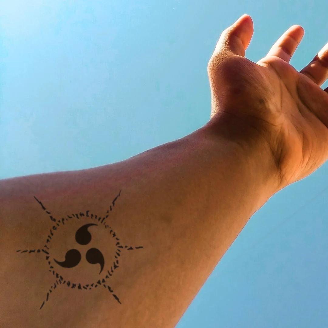 Tribal triskelion temporary tattoo