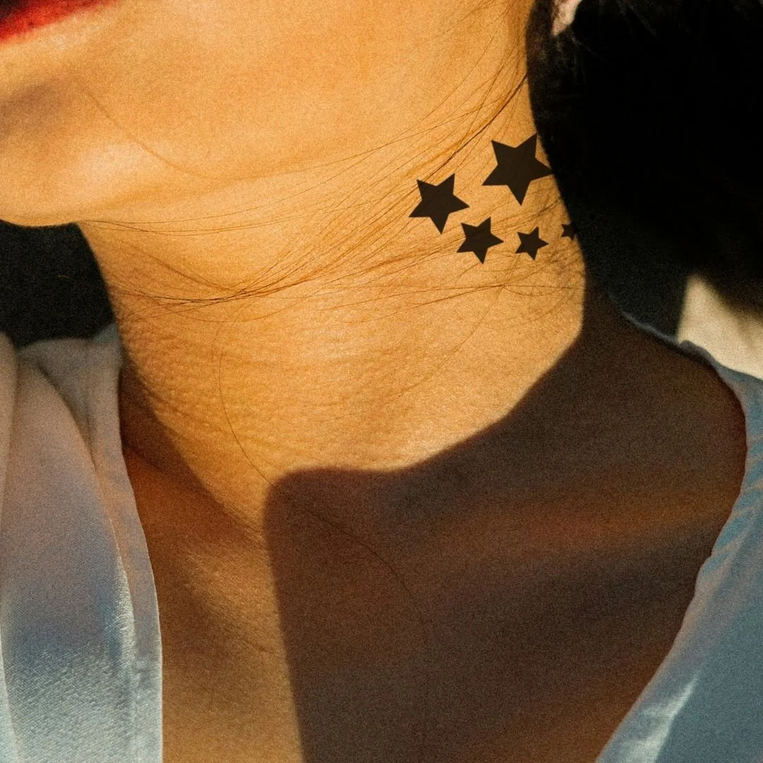 Five black stars temporary tattoo
