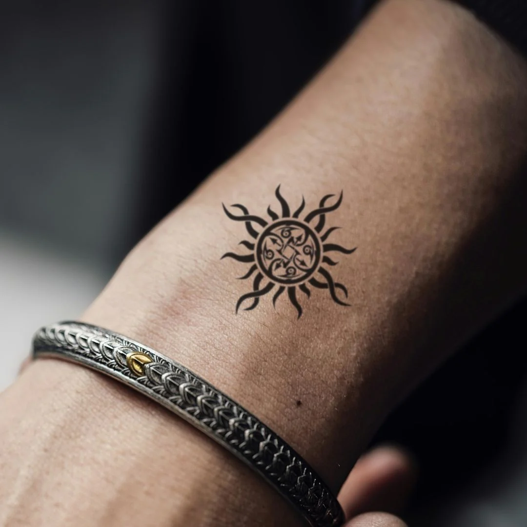Tribal sun temporary tattoo with arrows and spirals