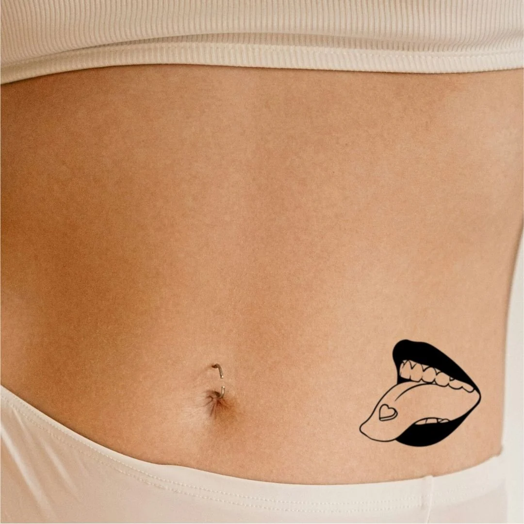 Mouth with tongue out and heart temporary tattoo