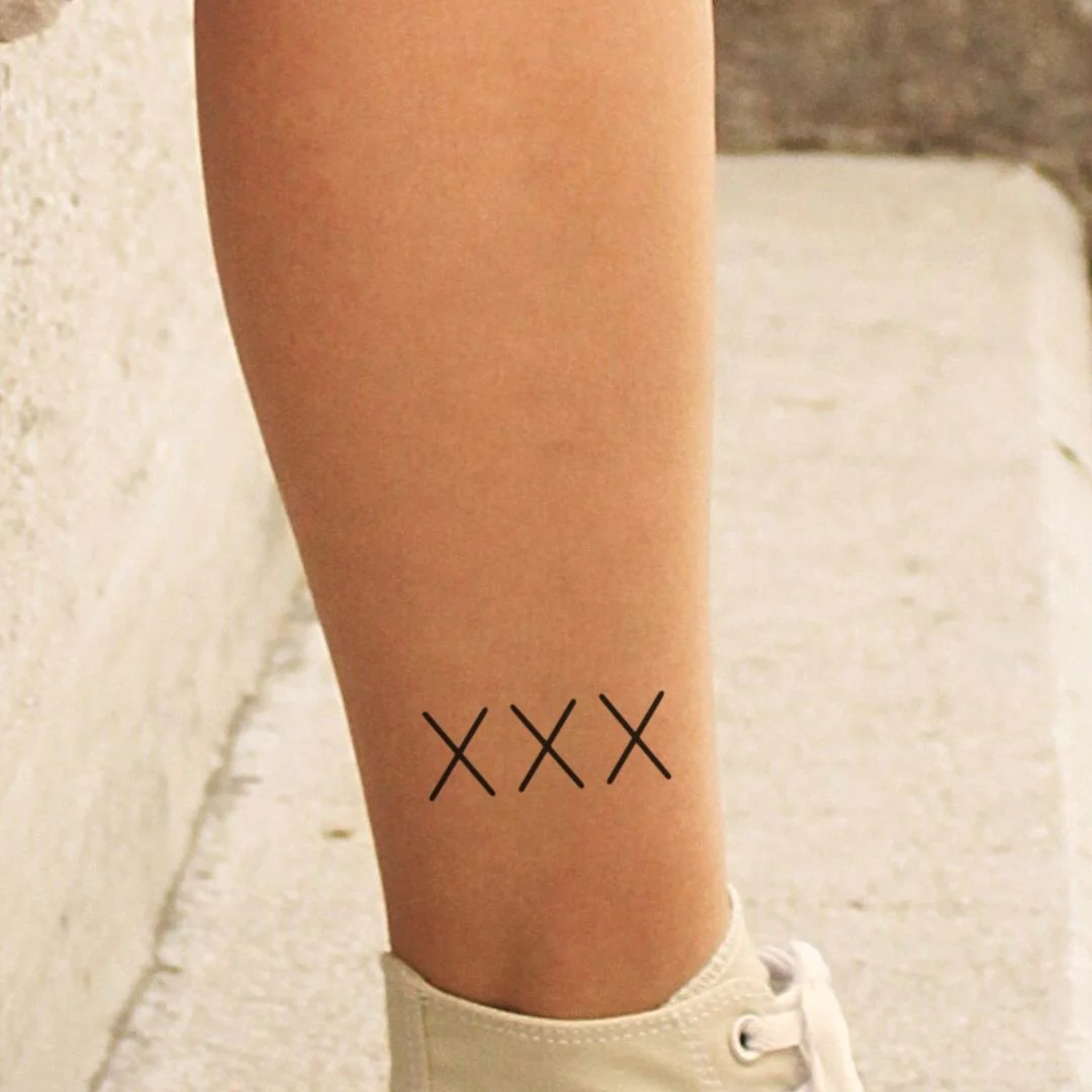 Triple X temporary tattoo
