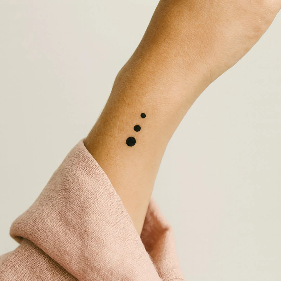 Three vertical dots temporary tattoo